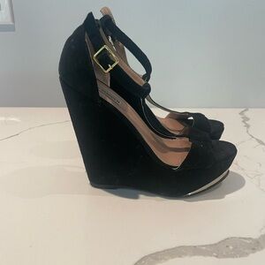 Steve Madden- Xtrime Black Platform
Wedges With Straps & Gold Detail